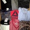 The photo shows a package with clothing in the category U.