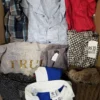 The photo shows a package with clothing in the category U.