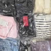 The photo shows a package with clothing in the category C.