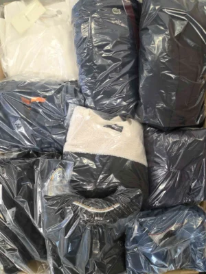 The photo shows a package with clothing in the category C.