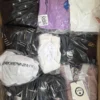 The photo shows a package with clothing in the category C.