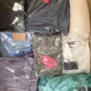 The photo shows a package with clothing in the category C.