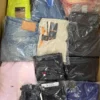 The photo shows a package with clothing in the category C.