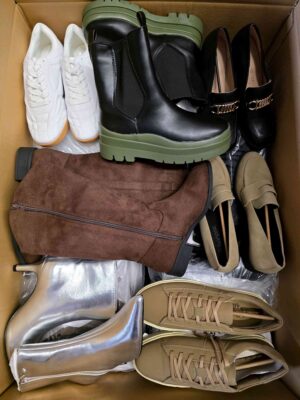 The photo shows a package with clothing in the category BPS.