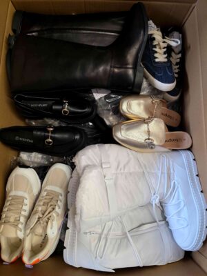 The photo shows a package with clothing in the category BPS.