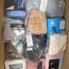 The photo shows a package with clothing in the category AU.