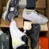 The photo shows a package with footwear in the category BS.