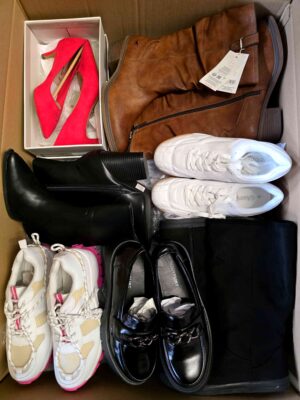 The photo shows a package with clothing in the category BPS.