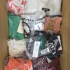 The photo shows a package with clothing in the category AU.