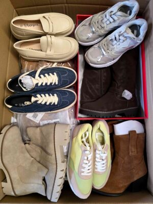 The photo shows a package with clothing in the category BPS.