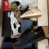 The photo shows a package with footwear in the category BS.