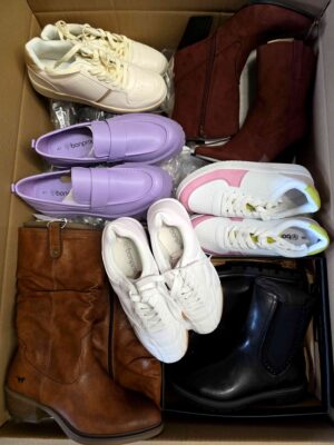 The photo shows a package with clothing in the category BPS.