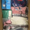 The photo shows a package with clothing in the category AU.