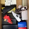The photo shows a package with footwear in the category BS.