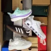 The photo shows a package with footwear in the category BS.