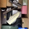 The photo shows a package with footwear in the category BS.