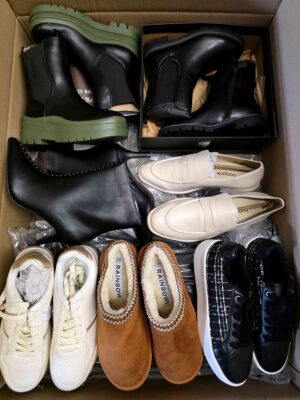 The photo shows a package with clothing in the category BPS.