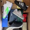 The photo shows a package with footwear in the category BS.