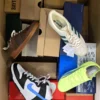 The photo shows a package with footwear in the category BS.