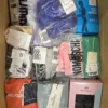 The photo shows a package with clothing in the category AU.
