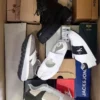 The photo shows a package with footwear in the category BS.
