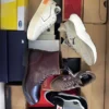 The photo shows a package with footwear in the category BS.