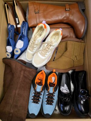 The photo shows a package with clothing in the category BPS.