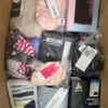 The photo shows a package with clothing in the category AU.