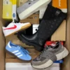 The photo shows a package with footwear in the category BS.