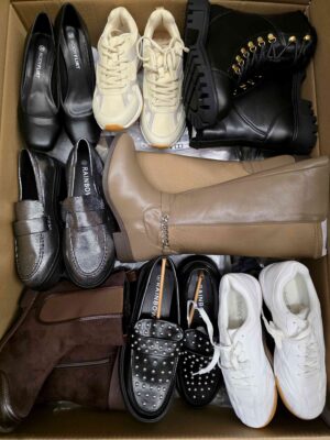 The photo shows a package with clothing in the category BPS.