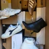 The photo shows a package with footwear in the category BS.
