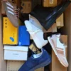 The photo shows a package with footwear in the category BS.