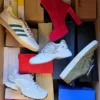The photo shows a package with footwear in the category BS.