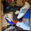 The photo shows a package with footwear in the category BS.