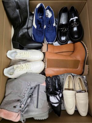 The photo shows a package with clothing in the category BPS.