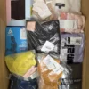AU296 1 The photo shows a package with clothing in the category AU.