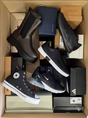 The photo shows a package with footwear in the category BS.