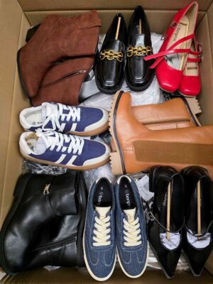 The photo shows a package with clothing in the category BPS.