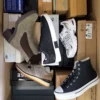 The photo shows a package with footwear in the category BS.