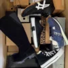 The photo shows a package with footwear in the category BS.