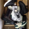 The photo shows a package with footwear in the category BS.