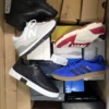 The photo shows a package with footwear in the category BS.