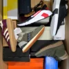 The photo shows a package with footwear in the category BS.