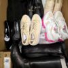 The photo shows a package with clothing in the category BPS.