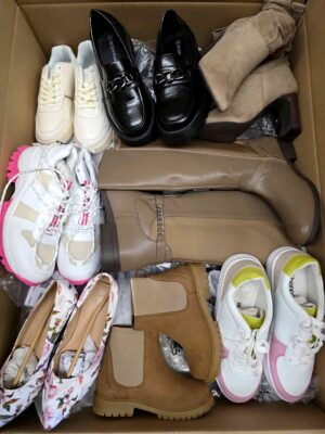 The photo shows a package with clothing in the category BPS.