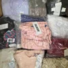 The photo shows a package with clothing in the category B.