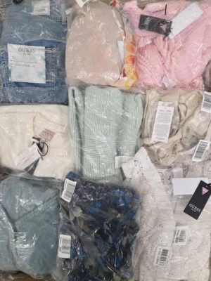 The photo shows a package with clothing in the category B.