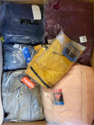 The photo shows a package with clothing in the category AJS.