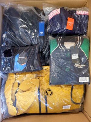 The photo shows a package with clothing in the category AJS.
