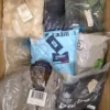 AM503 2 The photo shows a package with clothing in the category AM.